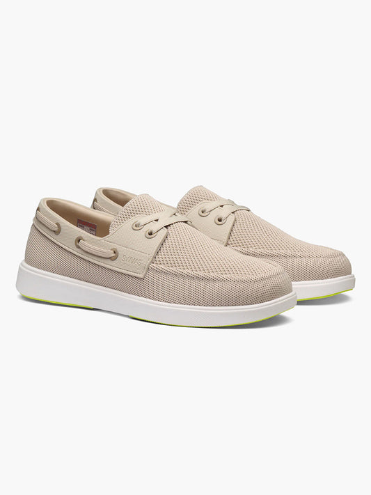 The Swims Breeze Boat Shoe in Mist/Sand features beige mesh uppers for lightweight comfort, white soles, lace-up design, and side eyelet details, shown on a plain white background.
