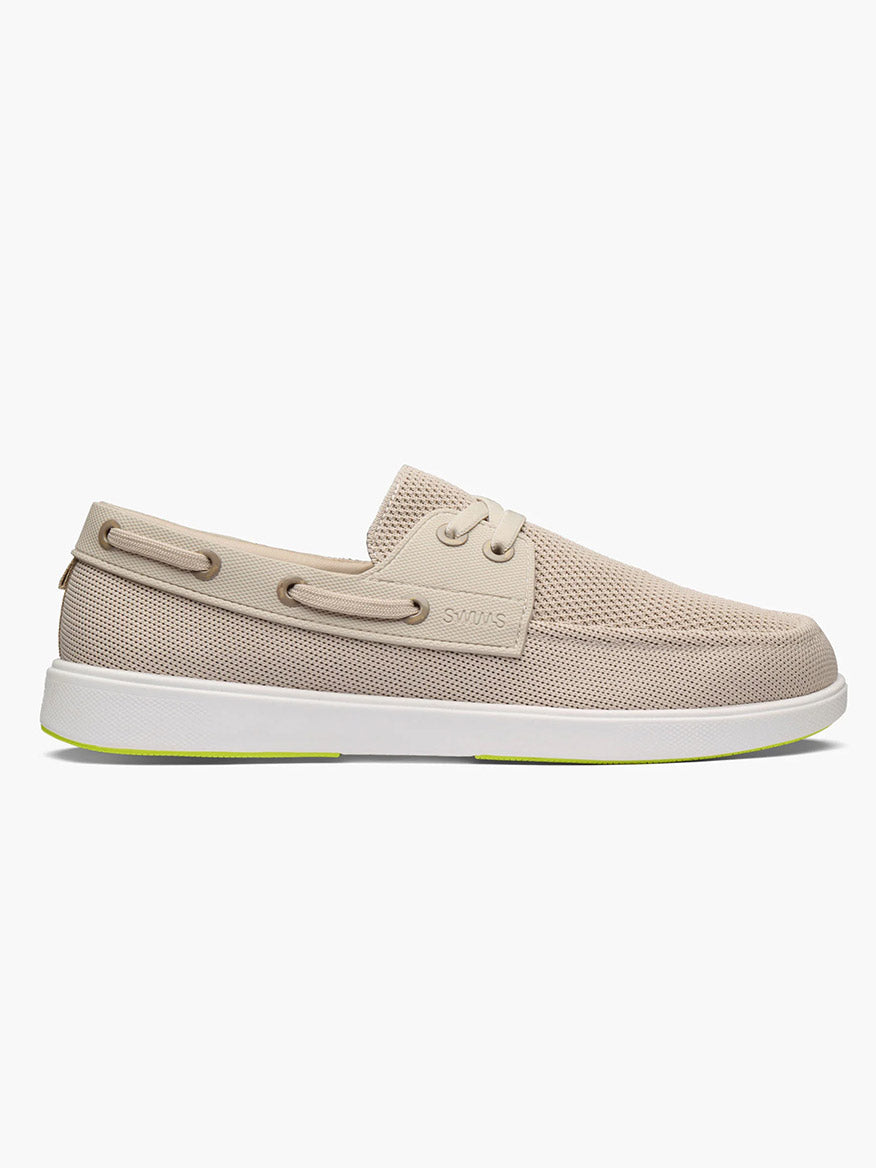The Swims Breeze Boat Shoe in Mist/Sand features a beige mesh upper, white sole, and light brown laces for lightweight comfort, shown from the side against a plain white background.