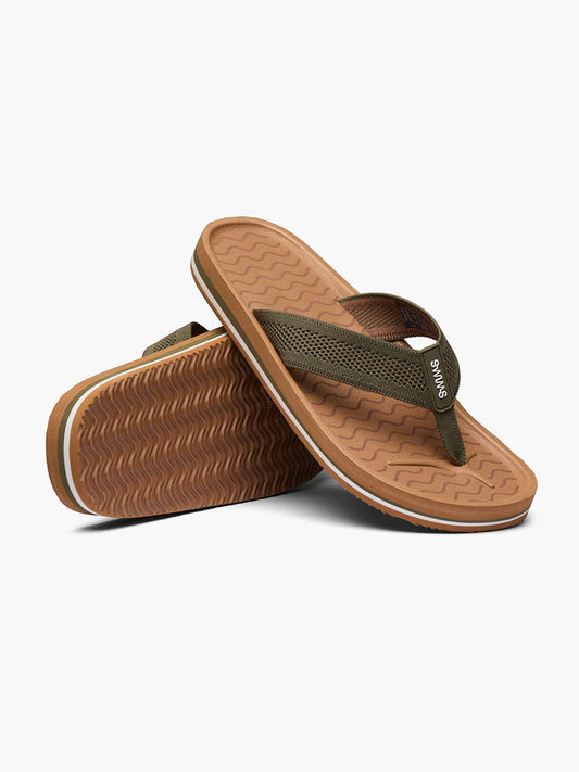 A pair of brown Swims Napoli flip-flops in Nut with a wavy sole pattern and arch support on a white background.