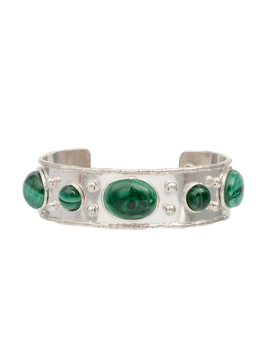 The Sylvia Toledano Cuff Byzantine in Malachite & Silver showcases malachite-green oval stones adorned with detailed dot accents, all beautifully crafted from brass gilded with silver.