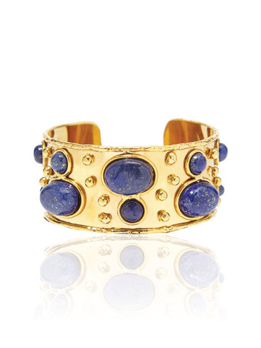 Introducing the Sylvia Toledano Cuff Byzantine in Lapis: a brass cuff bracelet gilded with fine gold, showcasing an intricate design embellished with large and small lapis stones.