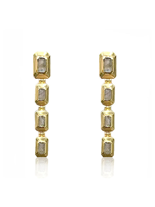 Tat2 Designs Labradorite Beryl Earrings in Gold feature four vertically aligned rectangular clear gemstones set in gold frames, blending vintage and modern styles, shown on a white background.