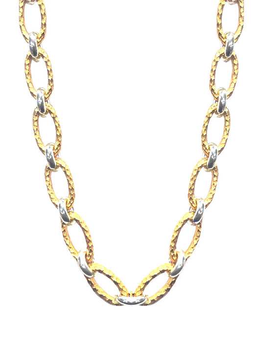 The Tat2 Designs Ravelle Hammered Chain 16" Necklace in Gold & Vintage Silver features large oval links and custom metal textures for a modern look, displayed against a white background.