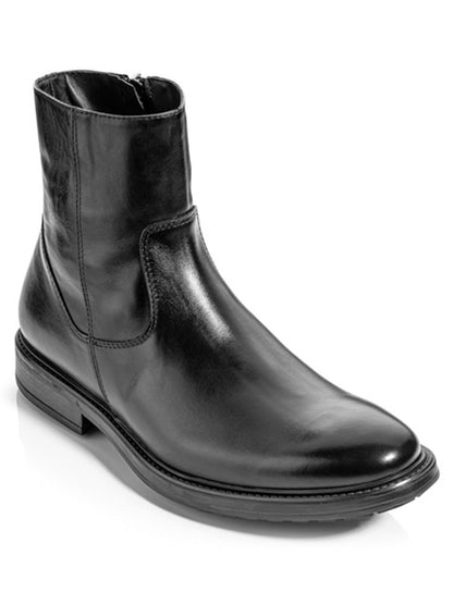 Handcrafted in Italy, the To Boot New York Emerson Boot in Black showcases a sleek black leather design with a side zipper, rounded toe, and low heel, elegantly displayed on a white background.