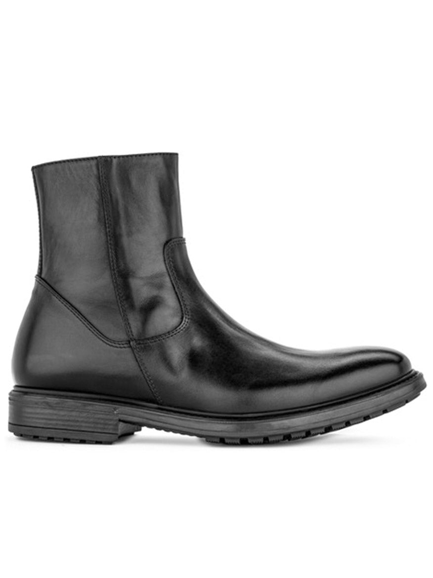 Presenting the To Boot New York Emerson Boot in Black—meticulously handcrafted in Italy from premium black calf leather, featuring a rounded toe, visible stitching, a side-profile silhouette, and a thick textured rubber sole for enduring style and durability.