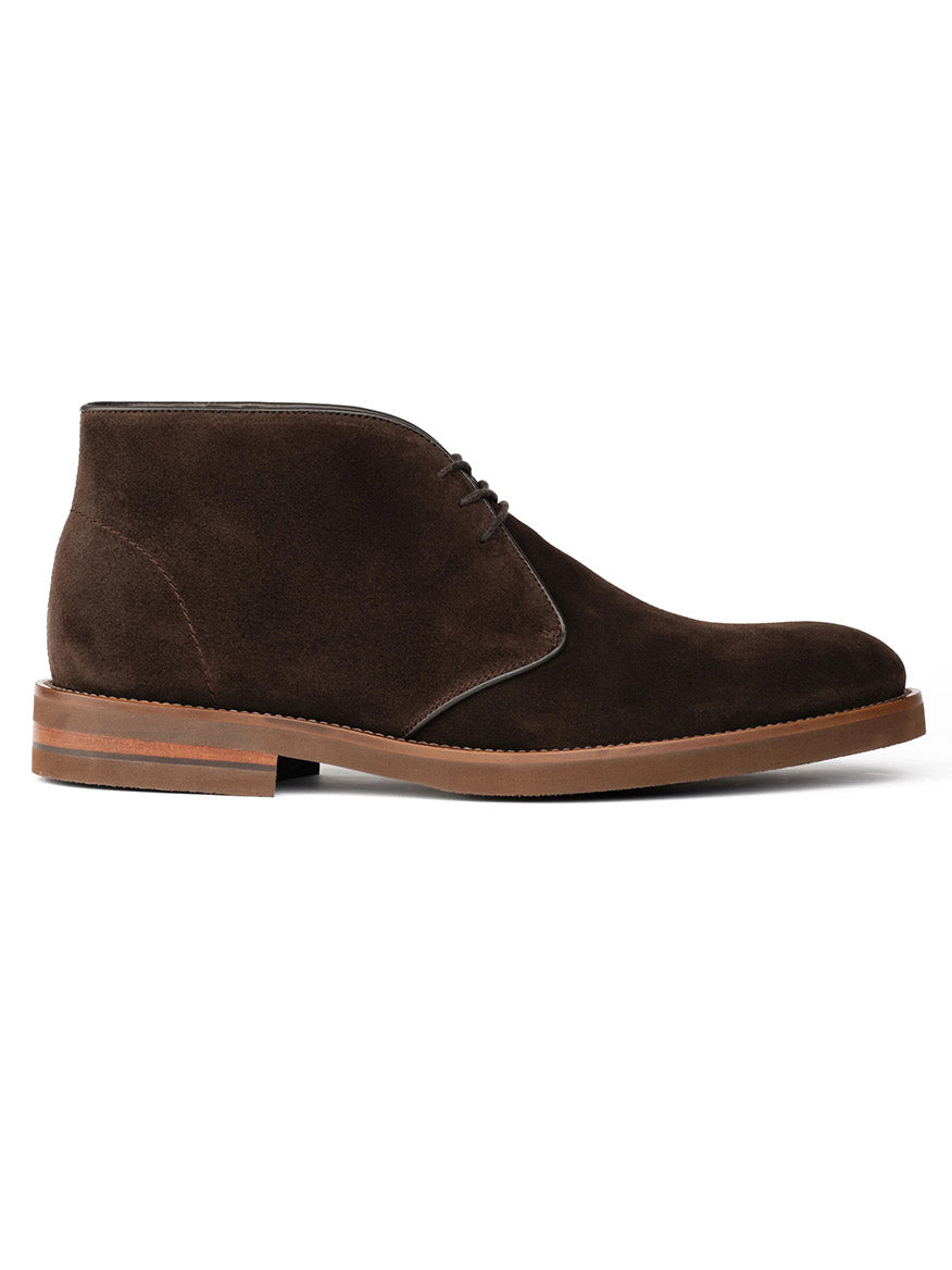 The To Boot New York Monaco Desert Boot in Dark Brown Suede features Italian calf suede, a round toe, three-eyelet lacing, and a light brown rubber sole—classic desert boot style with refined comfort.