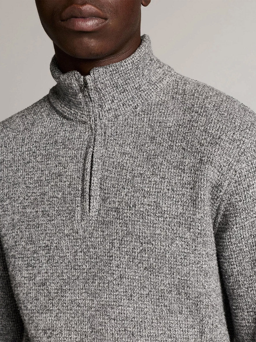 Someone wears the Vince Brushed Cotton-Blend Waffle Quarter-Zip Pullover in Heather Black, shown from shoulders to upper chest against a neutral background.