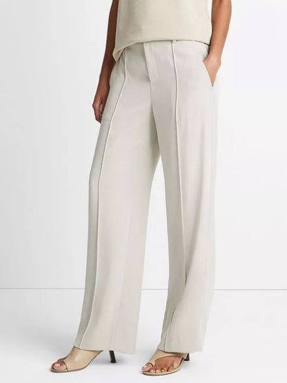 A person wearing Vince Crepe Wide-Leg Utility Pant in Sepia with belt loops and open-toe heels.