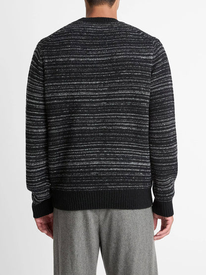 A person is shown from the back wearing a Vince Marled Stripe Merino Wool-Blend Sweater in Black and gray pants against a plain white background.
