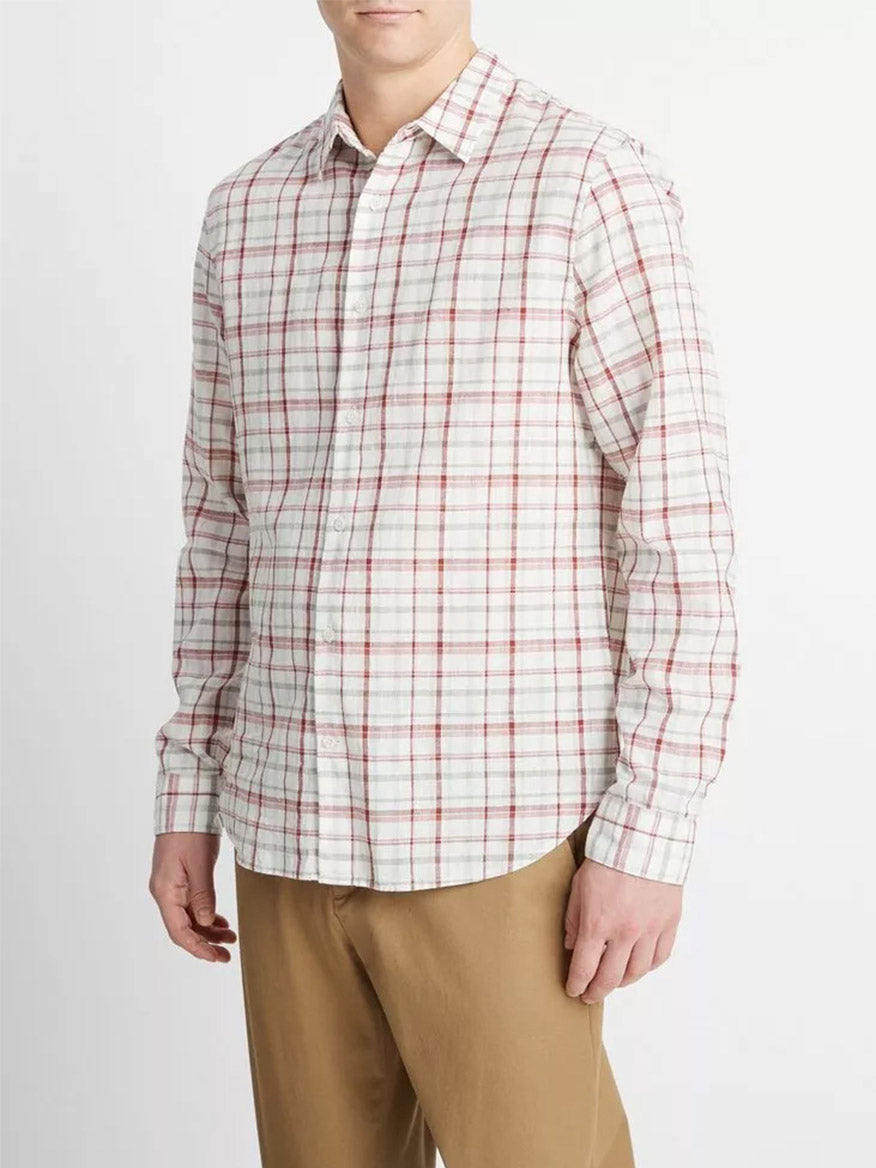 Man wearing a Vince Oakmont Plaid Long-Sleeve Shirt in Alabaster/Dried Cactus and khaki trousers.