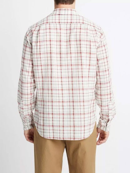 A man from behind wearing a Vince Oakmont Plaid Long-Sleeve Shirt in Alabaster/Dried Cactus and khaki pants.