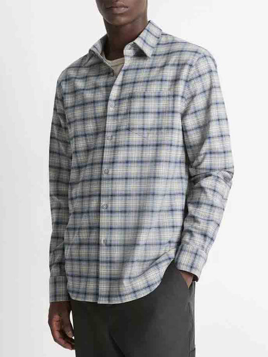 A person is wearing the Vince Oceanic Plaid Shirt in Bright Beluga Blue and Taupe paired with dark pants against a plain background. The lightweight weave of this long-sleeve shirt enhances its comfortable style.