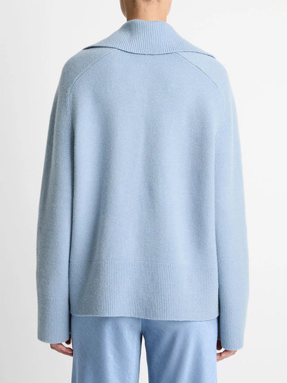 A person is shown from the back wearing the Vince Wool & Cashmere-Blend Oversized Polo Sweater in Pacific with matching pants, set against a plain white background.