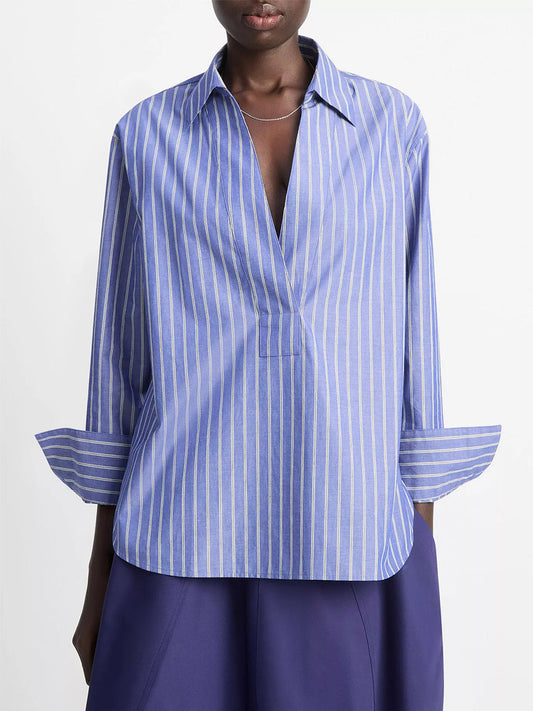 Wearing the Vince Striped Cotton Relaxed Popover Shirt in Pale Twilight with purple pants creates a perfect transitional weight layering look.