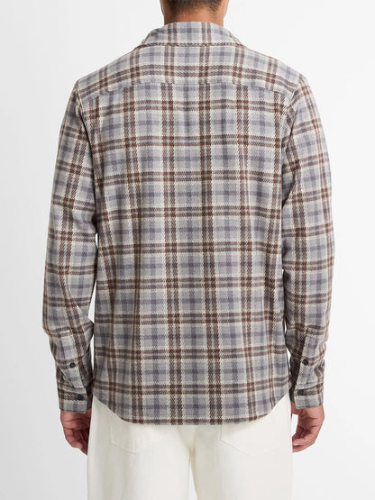 A person shown from the back, wearing the Vince Plaid Cotton-Blend Shirt Jacket in Heather Fog Combo with white pants, against a plain white background.