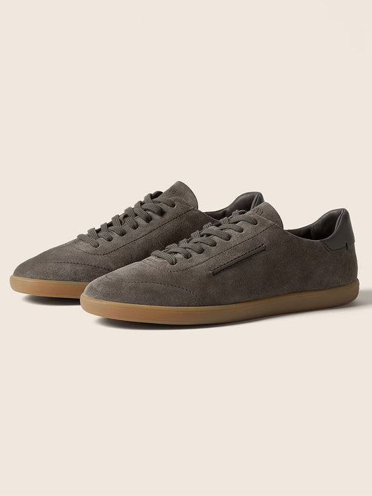A pair of Zegna 232 Suede Sneakers in Dark Taupe with gum rubber soles, black heel accents, matching dark taupe laces, and made in Italy is displayed on a neutral background.