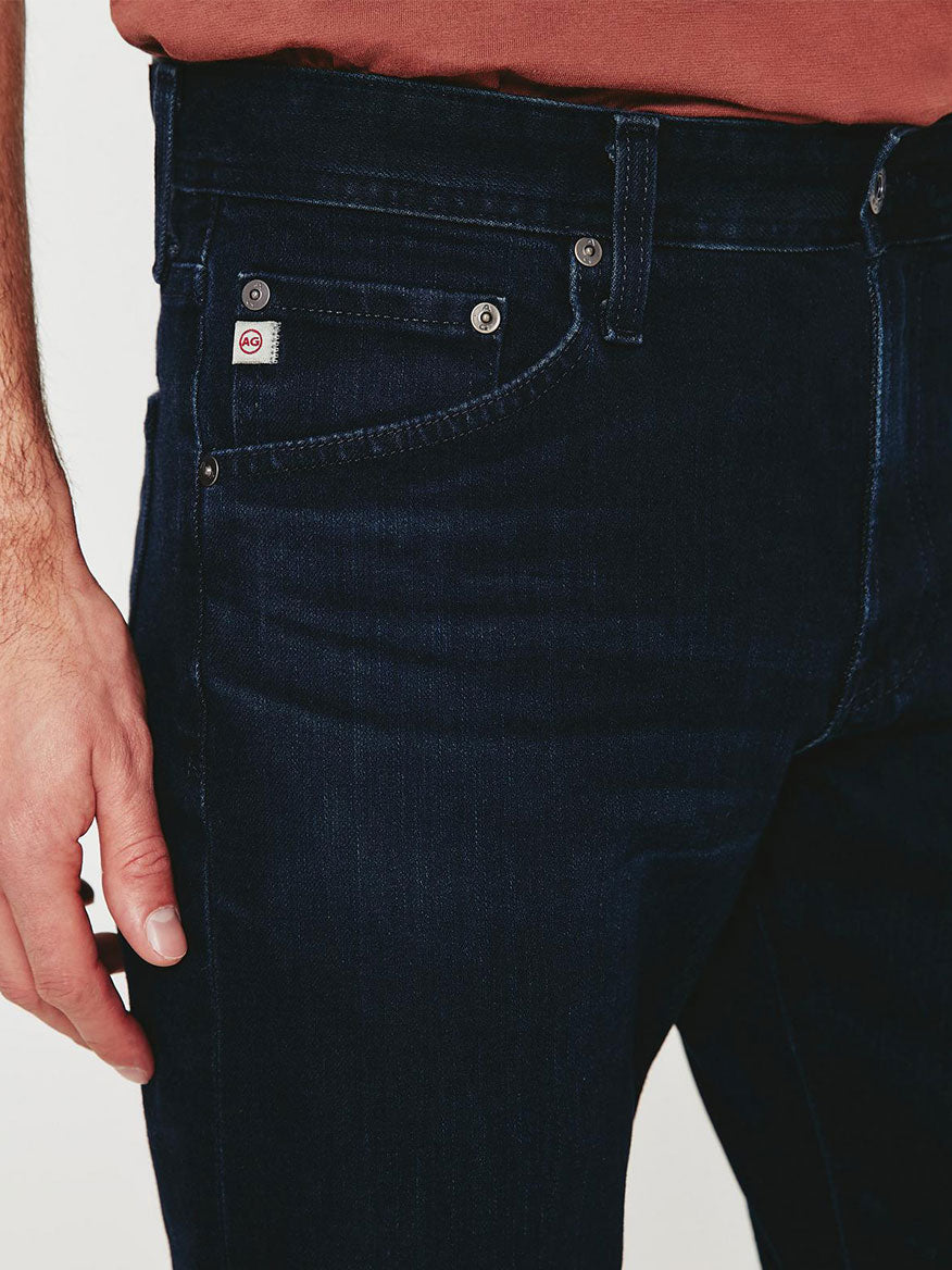 A man wearing a pair of AG Jeans Everett in Bundled.