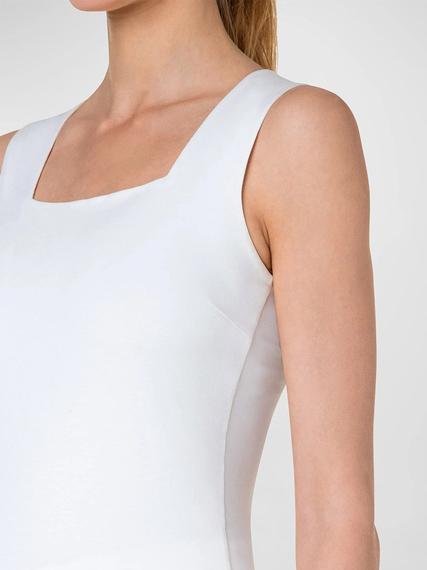 A woman is wearing an Akris Punto Square-Neck Jersey Tank Top in Cream.