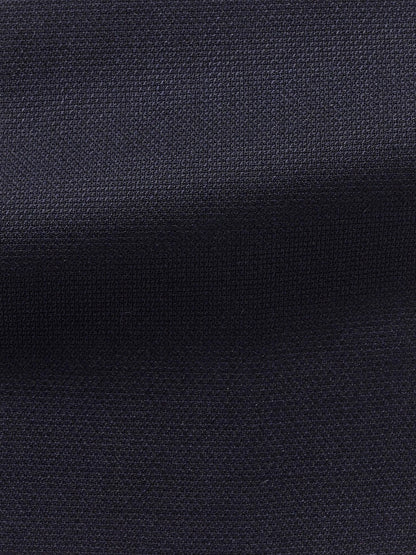 An intricately textured Atelier Munro Dark Blue Stretch Wool Blazer fabric with a wool blend.