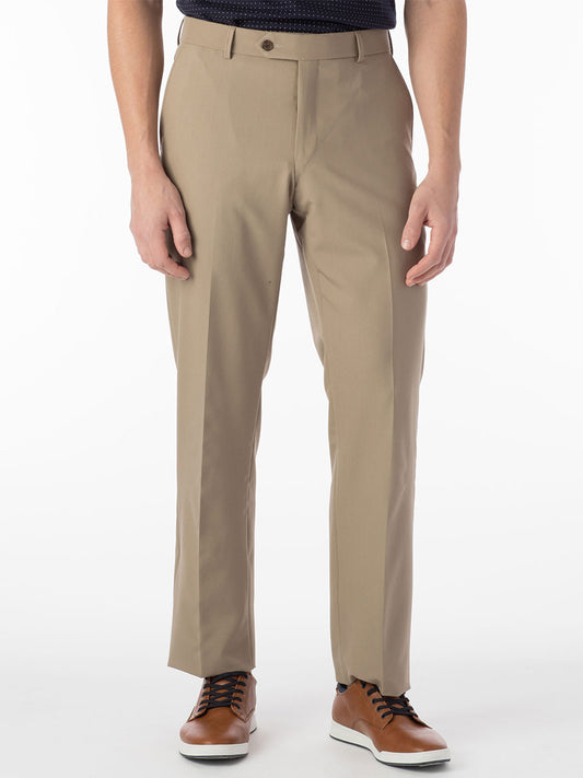 A man dressed in Ballin Connor Comfort 'EZE' Modern Flat Front Pant in Khaki and a black shirt exudes total comfort and maintains shape retention.