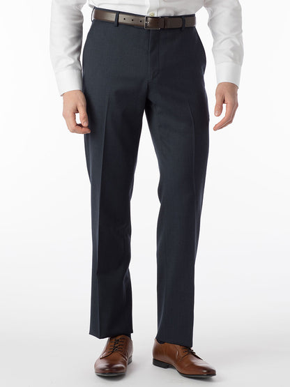 A man is standing in a wool gabardine dress shirt and Ballin Theo Comfort 'EZE' Modern Flat Front Pant in Navy Mix.