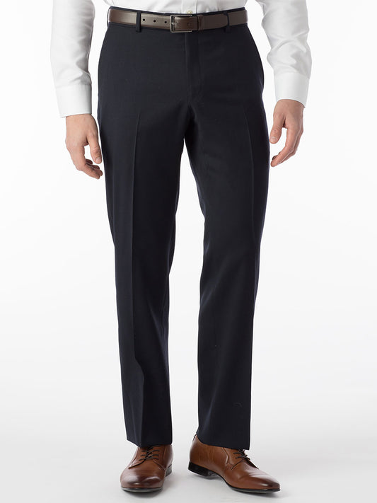 A man wearing Ballin Theo Comfort 'EZE' Modern Flat Front Pant in Navy made of wool gabardine, providing high performance and comfort.
