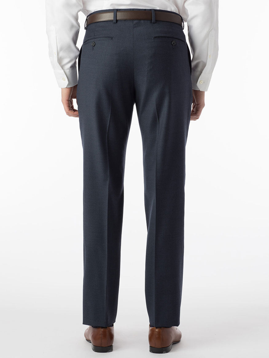 The back view of a man wearing Ballin Soho Comfort 'EZE' Super 120s Modern Flat Front Pant in Navy Mix dress pants.