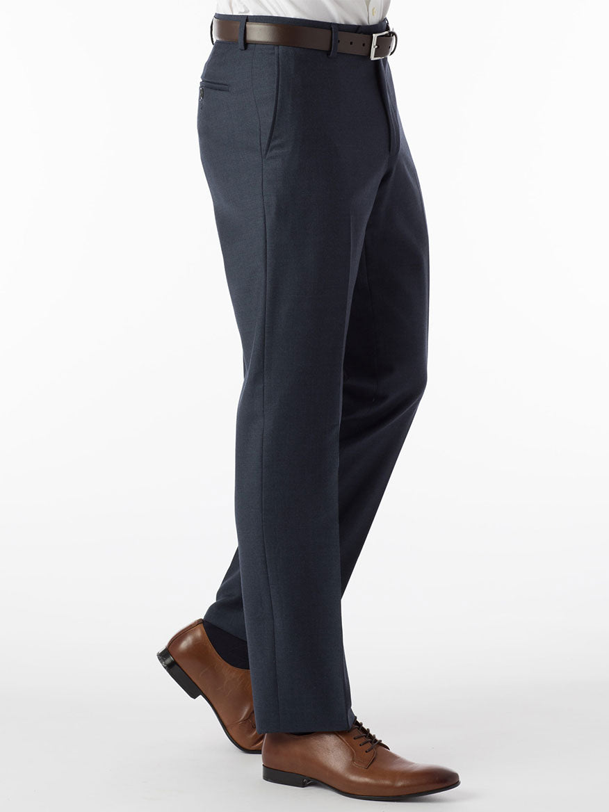 A Ballin Soho Comfort 'EZE' Super 120s Modern Flat Front Pant in Navy Mix man is standing in a Super 120's blue suit with brown shoes.