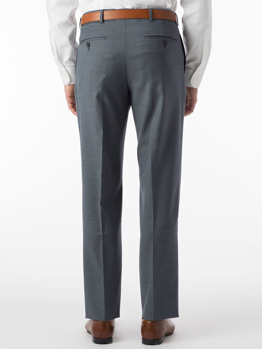 The back view of a man in Ballin Soho Comfort 'EZE' Super 120s Modern Flat Front Pant in Slate Blue dress pants.