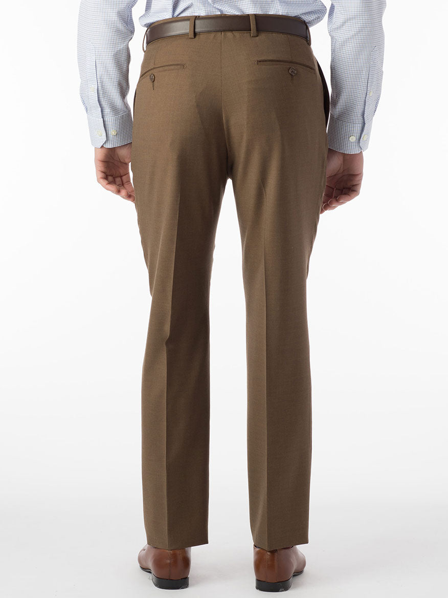 The back view of a man wearing the Ballin Soho Comfort 'EZE' Super 120s Modern Flat Front Pant in Tobacco made of serge.