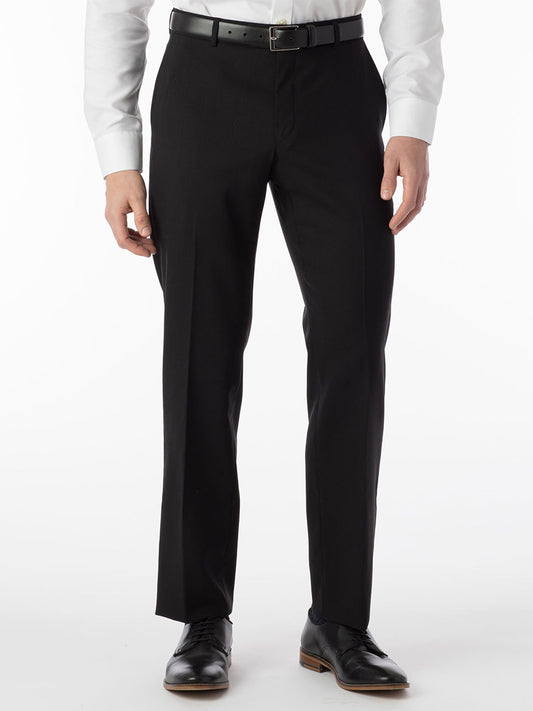 A man wearing Ballin Soho Comfort 'EZE' Super 120s Modern Flat Front Twill Pant in Black and a white shirt with Super 120's fabric and a Comfort "EZE" waistband.