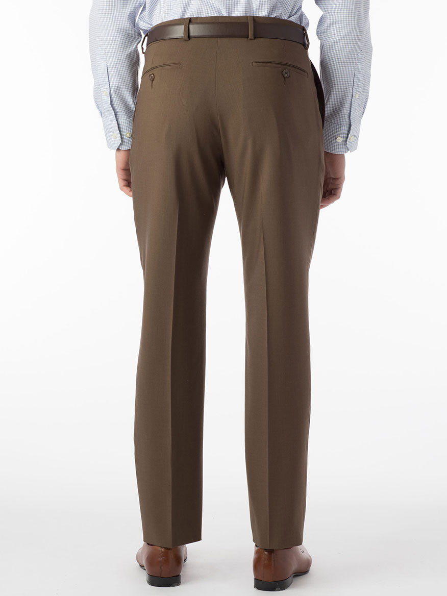 The back view of a man wearing brown dress pants with a Ballin Soho Comfort 'EZE' Super 120s Modern Flat Front Twill Pant in Saddle waistband for added durability and comfort.