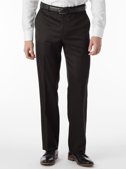 A man wearing Ballin Dunhill Micro Nano Traditional Flat Front Pant in Black made of microfiber and a white shirt.