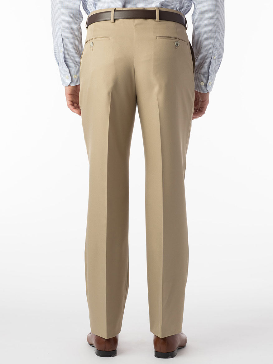 The back view of a man wearing Ballin Dunhill Micro Nano Traditional Flat Front Pant in Tan made of nanotechnology-treated fabric for ultimate comfort and enhanced durability.