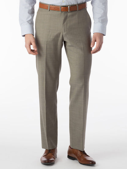 A man wearing Ballin Soho Comfort 'EZE' Sharkskin Modern Flat Front Pant in British Tan suit pants and a brown shirt made of performance fabric for Comfort "EZE" construction.