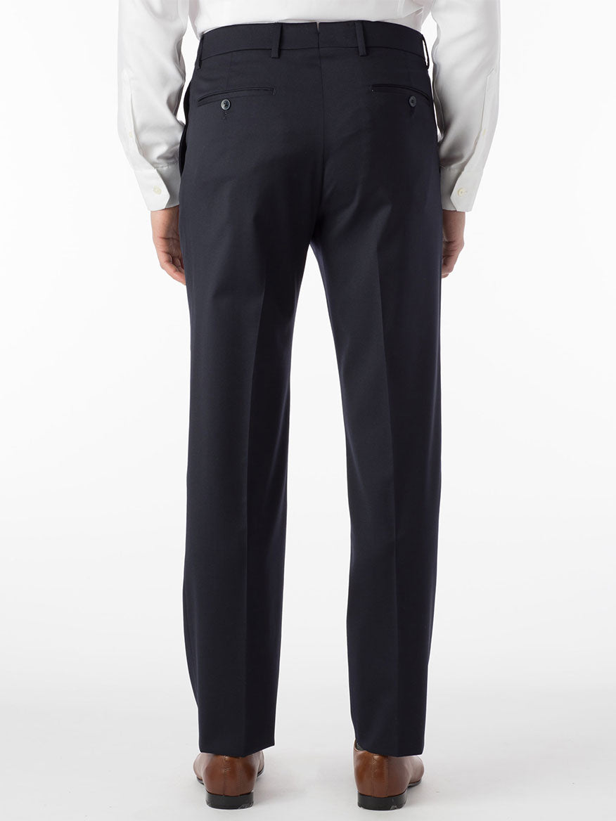 The back view of a man wearing Ballin Houston Super 130s Modern Flat Front Pant in Navy made from Super 130's wool.