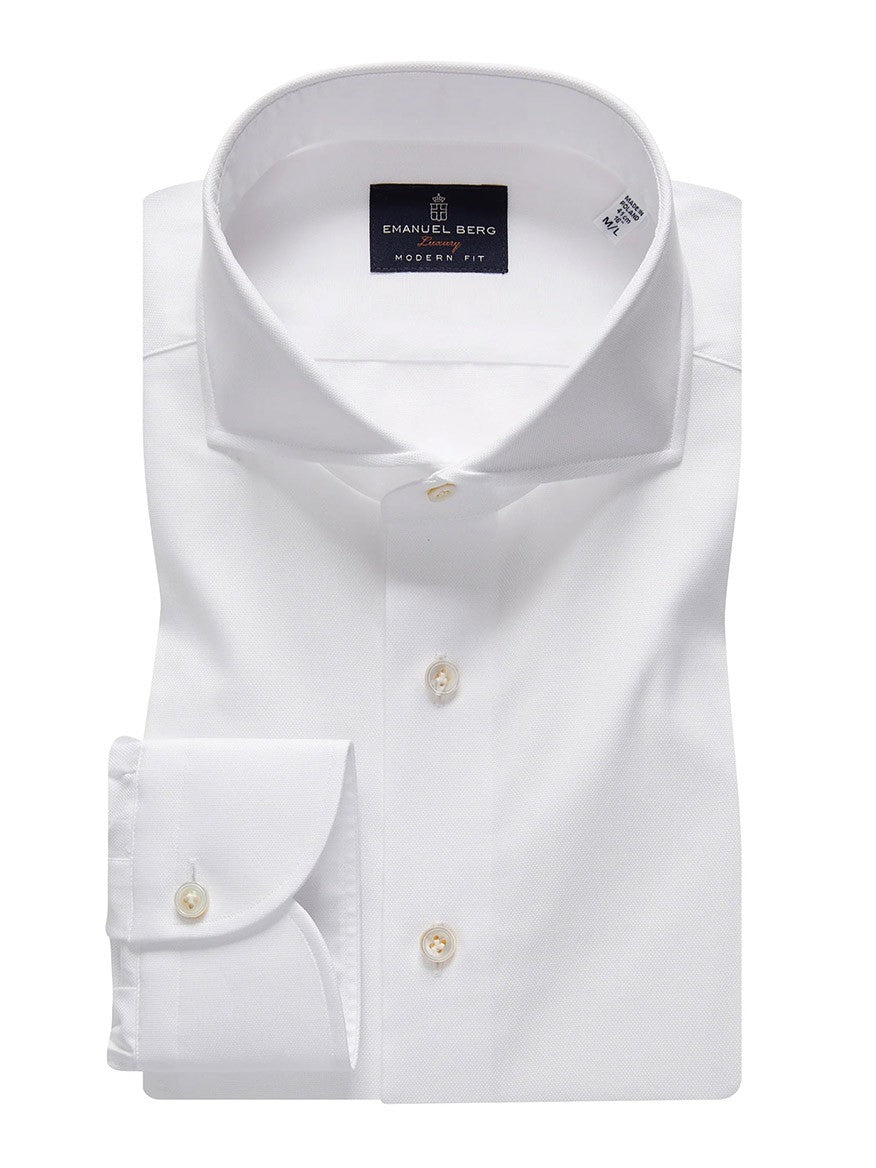 Folded Emanuel Berg Premium Luxury Dress Shirt in White with Mother of Pearl buttons on a plain background.