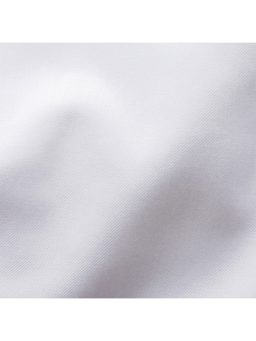 Close-up of a wrinkle-free Eton Classic Fit Twill Dress Shirt in White textured fabric background.