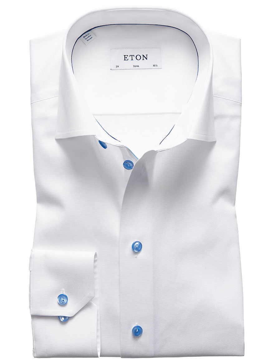 A Eton Slim Fit White Twill Dress Shirt With Blue Details, displayed flat.