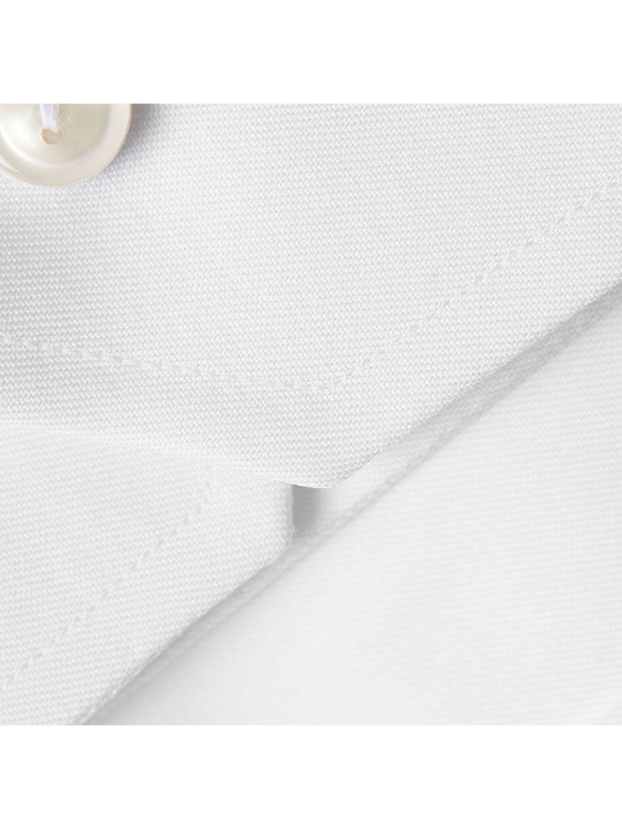 Close-up of a Eton Contemporary Fit White Twill Evening Shirt with a button visible.