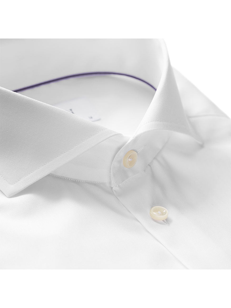 Close-up of the Eton Slim Fit White Extreme Cut Away Dress Shirt with two beige buttons and a subtle purple trim inside the neckline.