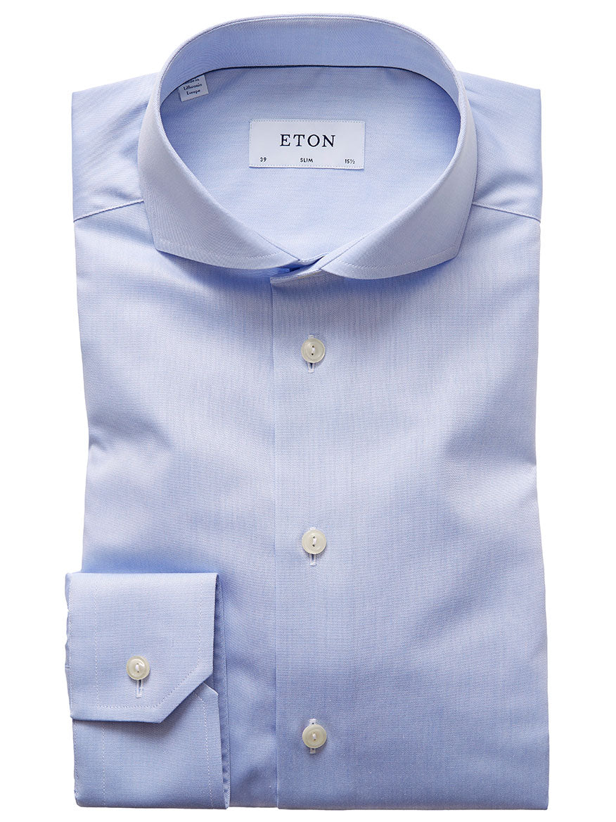 A sky blue Eton Slim Fit Extreme Cut Away Dress Shirt with white buttons and a brand label on the inside collar.