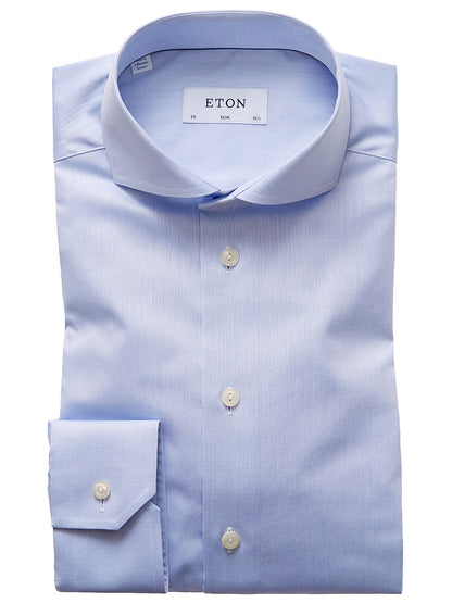 A sky blue Eton Slim Fit Extreme Cut Away Dress Shirt with white buttons and a brand label on the inside collar.
