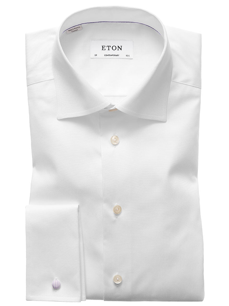A neatly folded Eton Contemporary Fit White French Cuff Dress Shirt with wrinkle-free fabric and French cuffs.
