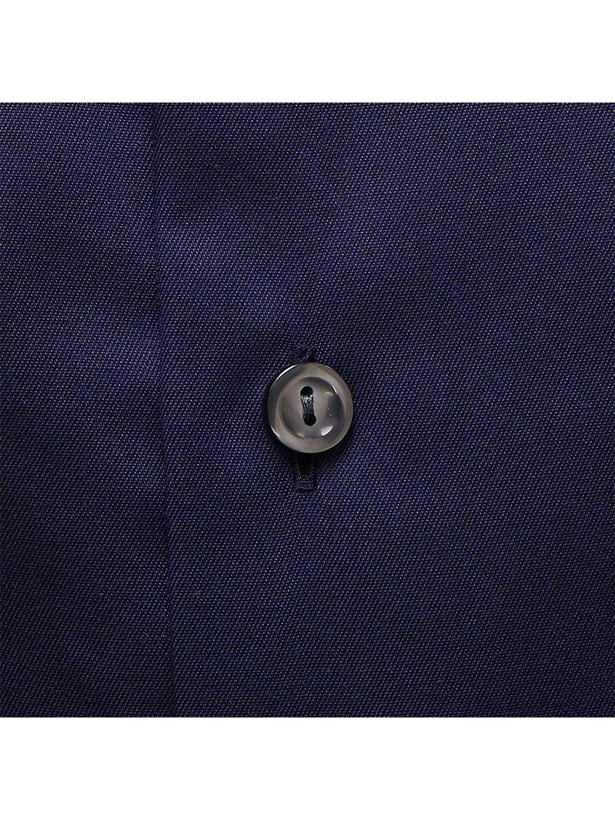 A close up of the Eton Slim Fit Navy Signature Twill Dress Shirt on a blue suit, perfect for a formal event or business meeting.