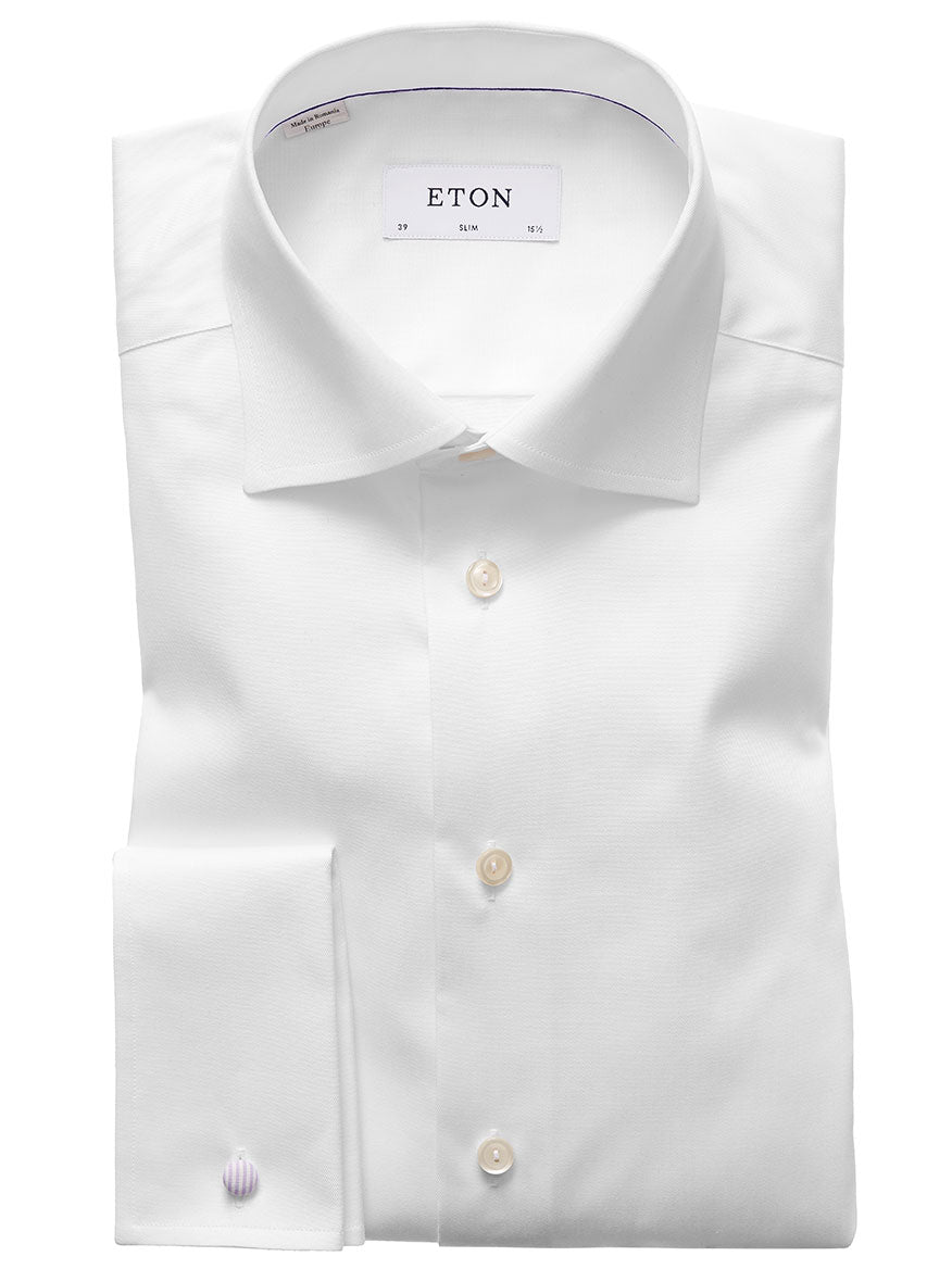 The Eton Slim Fit White French Cuff Dress Shirt features a classic collar and wrinkle-free finish, neatly folded and displayed against a white background.