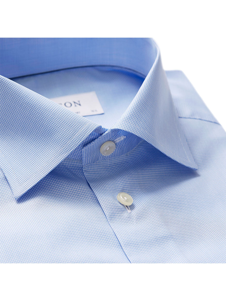 Close-up of a Light Blue Eton Contemporary Fit Houndstooth Dress Shirt collar showing detail of fabric and buttons.