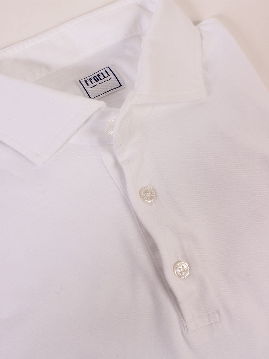 Fedeli Short Sleeve Polo dress shirt in White made in Italy, with a close-up on the collar and buttons.