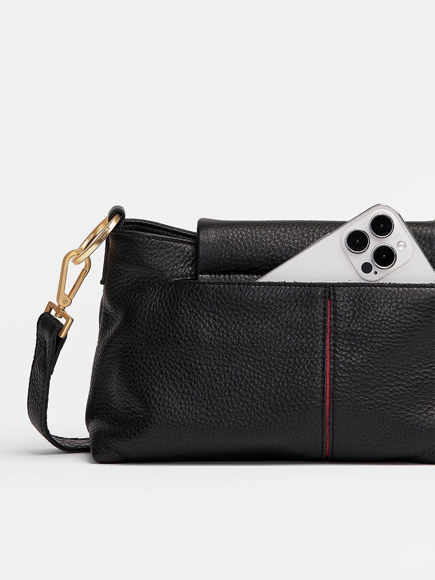 The Hammitt Los Angeles VIP Satchel in Black/Brushed Gold features a pebbled leather bag with a gold clasp and includes a magnetic cell pocket, ideal for holding a smartphone with a triple-lens camera.