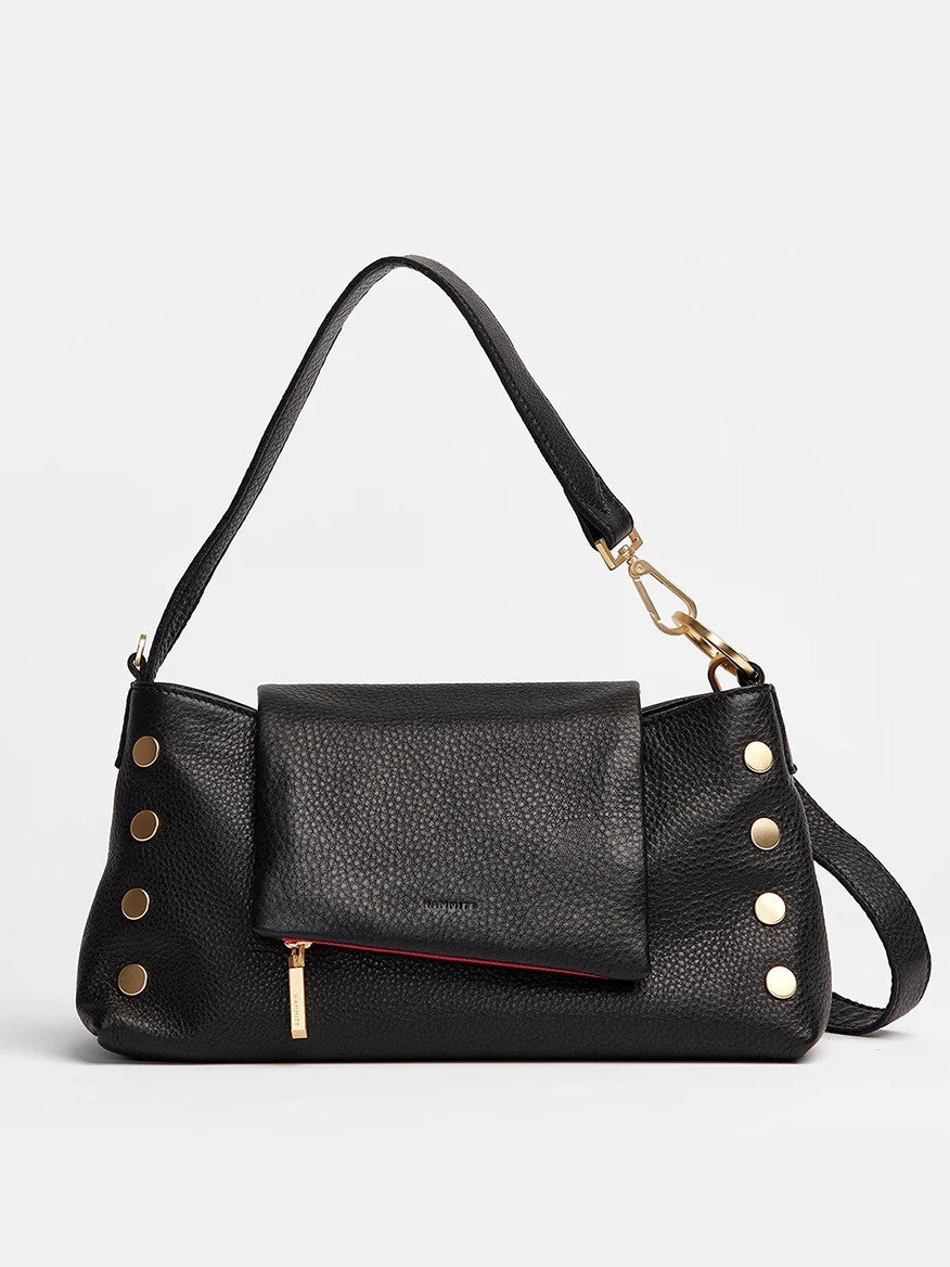 The Hammitt Los Angeles VIP Satchel in Black/Brushed Gold is a black leather handbag featuring gold buttons, a front flap, and a gold zipper. It includes a detachable shoulder strap and showcases a textured pebbled leather finish. Inspired by the Hammitt VIP collection, it also has a convenient magnetic cell pocket for easy access.
